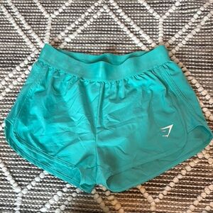 Gymshark Training Loose fit shorts. Blue/green - woman’s size S - like new